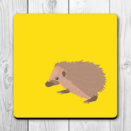 Walking baby hedgehog illustration on bright yellow coaster from UmmPixies