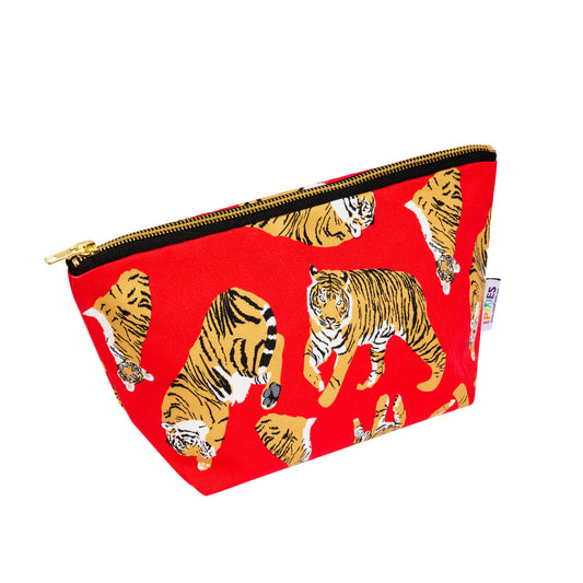 Pouch with tiger pattern on a red background