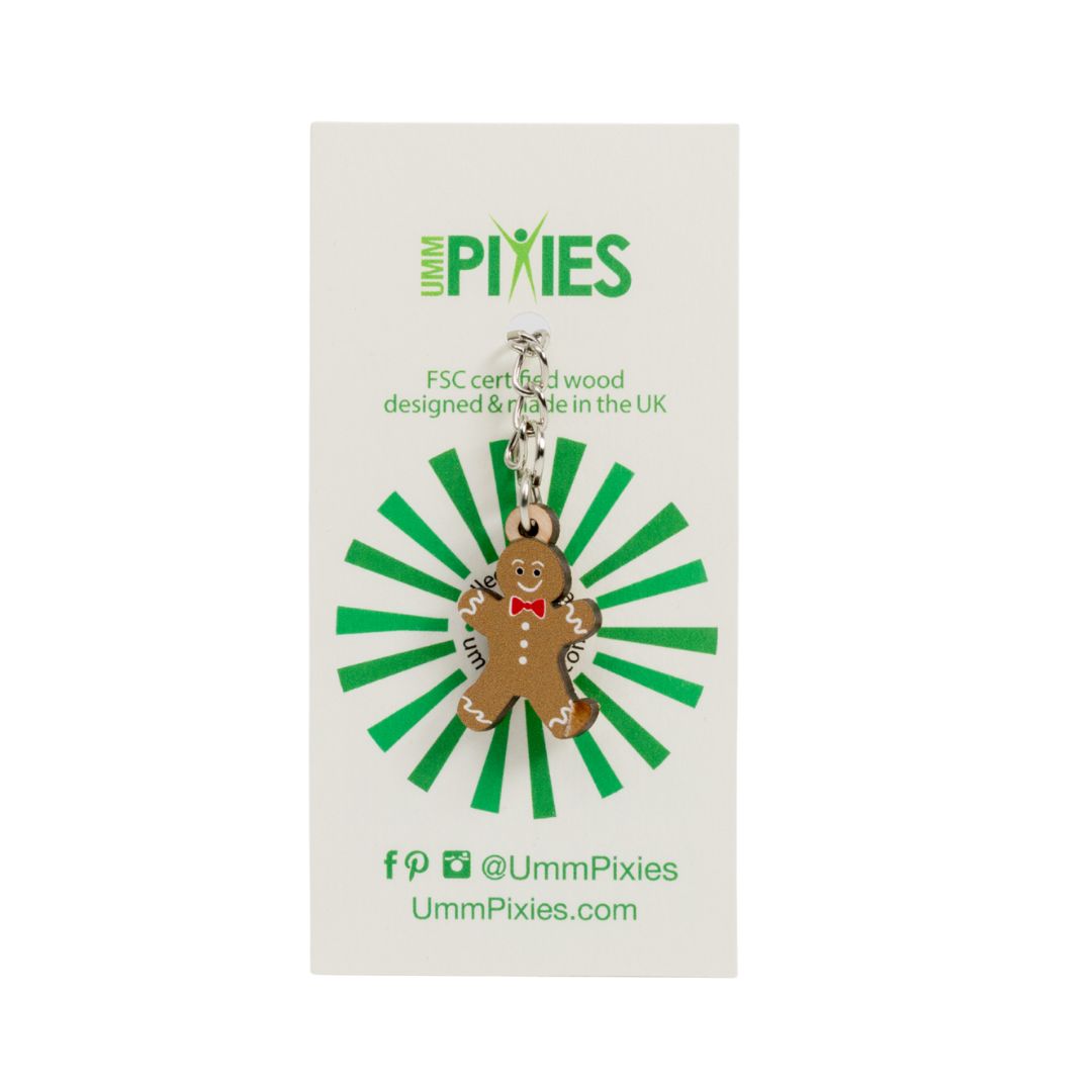 Umm Pixies Gingerbread Biscuits with decorative bowtie wooden charm keyring on a branded card with green and white design