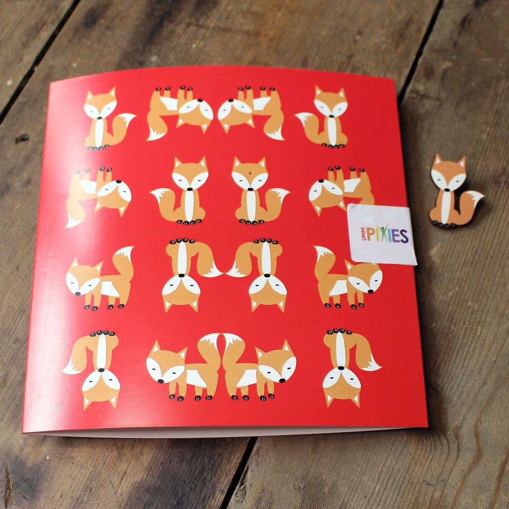Foxes on Parade Square greetings card