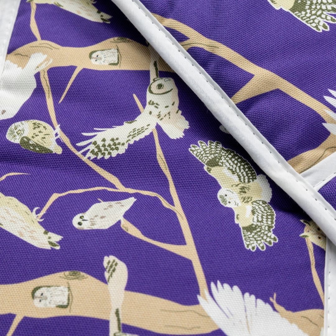 close up of bright purple organic cotton oven gloves with Owls of Britain illustration from UmmPixies