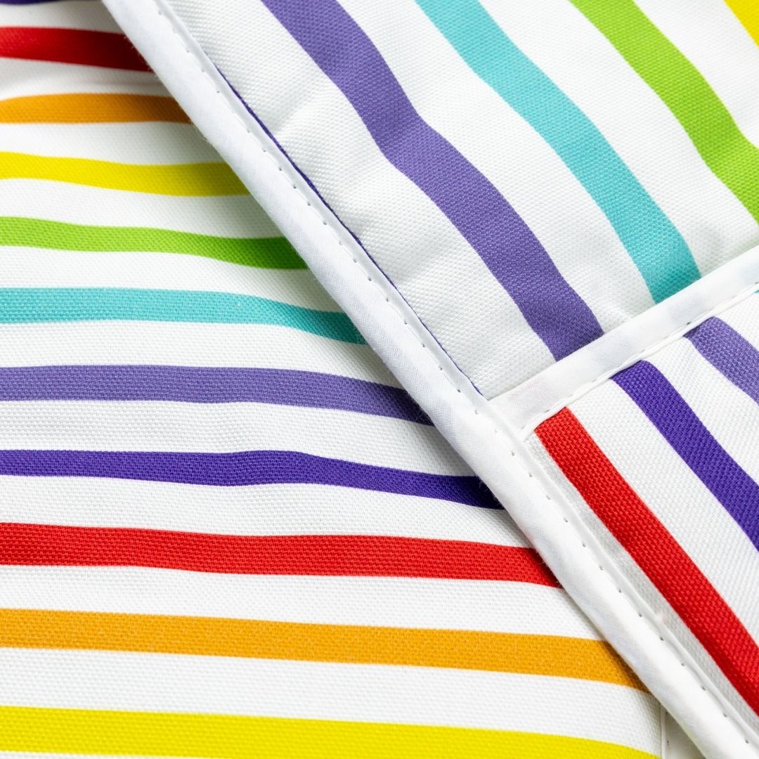 Close up of a folded pair of Wide Rainbow Stripe Oven Gloves showing the edge of the binding and clear rainbow coloured stripes