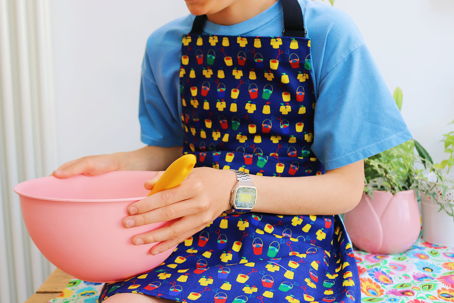 Seaside Apron - model wears 6-12 year old size of the organic cotton penny