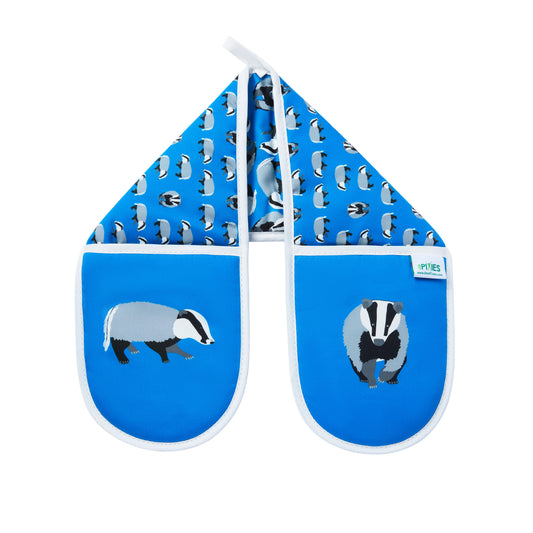 Blue oven mitts with badger design on a white background