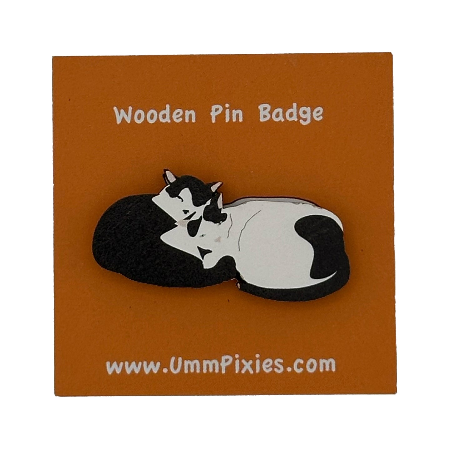 UmmPixies Curled Up Cats Wooden Pin Badge shown on display card