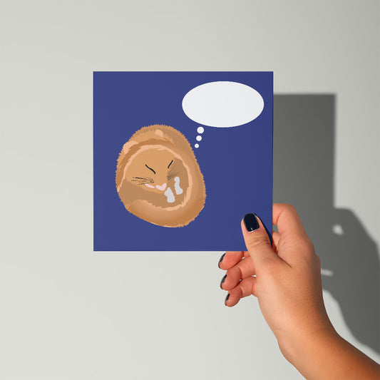 Hand holding a card with a dormouse illustration and thought bubble 
