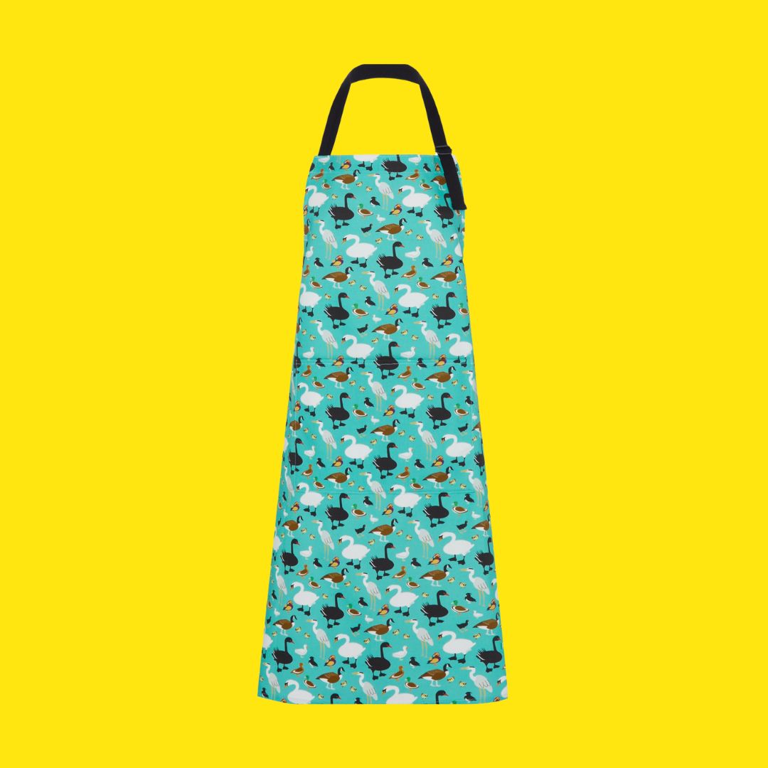 colourful adult sized cotton apron with ducks and geese and swans shown on yellow background apron