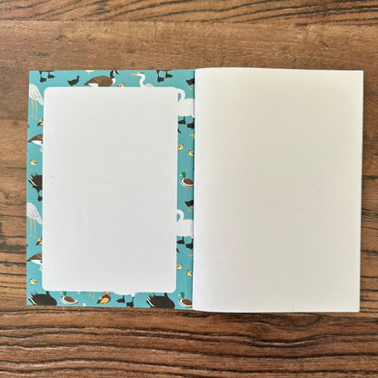 detail of the Inside front cover of ducks pocket notebook showing design detail
