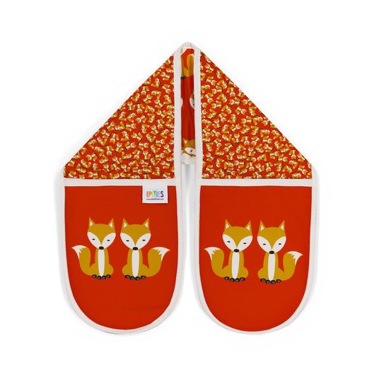 bright red colourful organic cotton oven gloves illustrated with fun fox design showing a parade of foxes on one side and a scatter of tiny foxes on the other. The main glove mitts each features a distinctive pair of sitting foxes