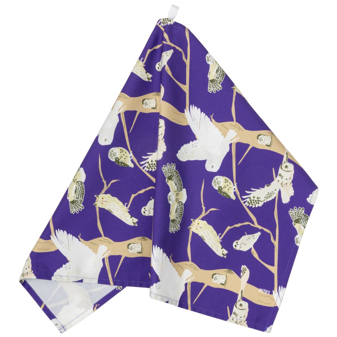 Purple tea towel with pattern showing the 5 native species of British owls 