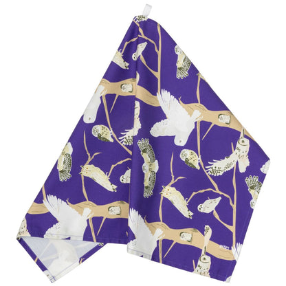 Purple tea towel with pattern showing the 5 native species of British owls 