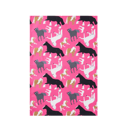 Pattern of horses on a pink cotton tea towel