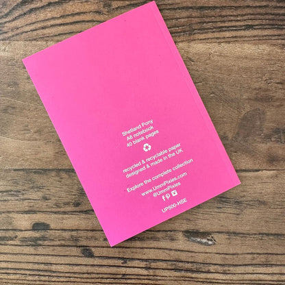 back cover of pink horses design pocket notebook 