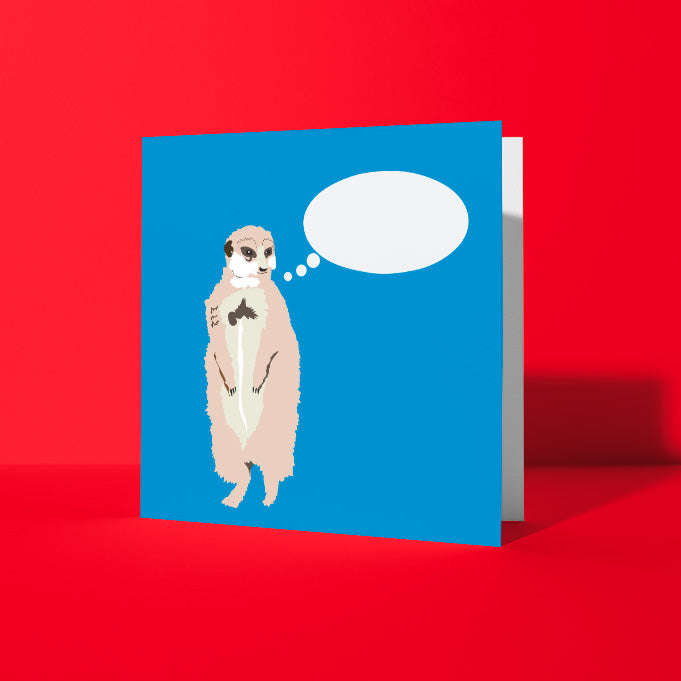 Blue Square Greetings Card with Meerkat on sentry duty  illustration and thought bubble to fill in in order to personalise the card - shown on red background