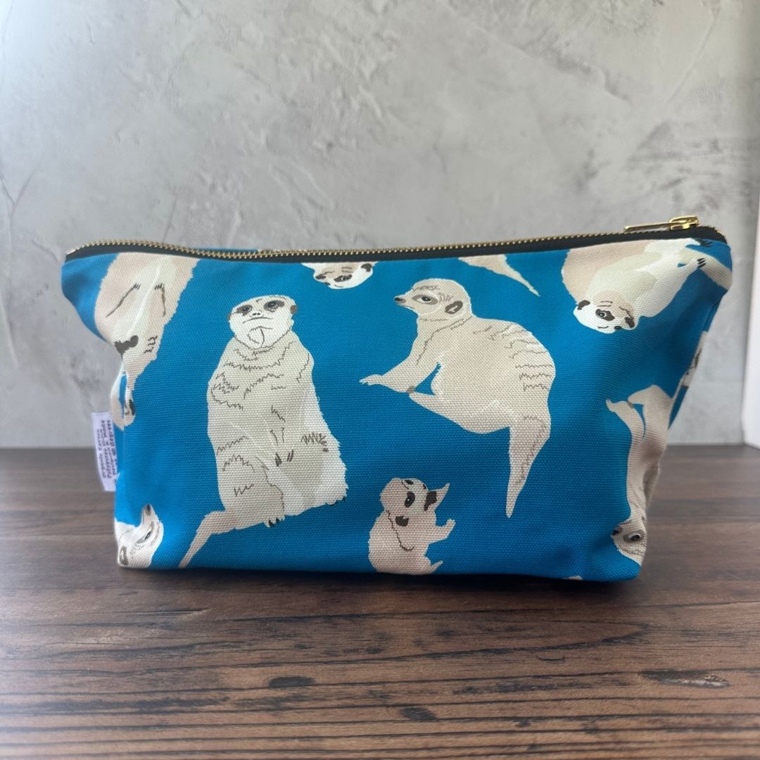 Bright blue Meerkats illustrated really useful bag shown closed
