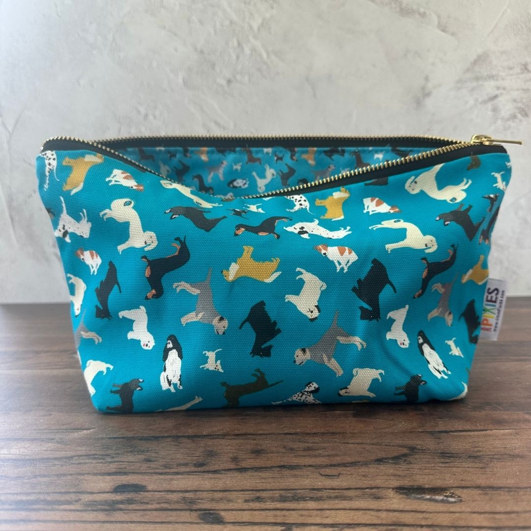 Petrol Blue Dogs illustrated really useful bag shown open with waterproof printed lining visible