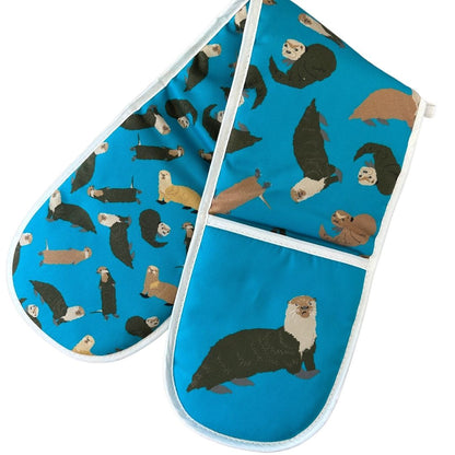 Oven mitt and pot holder with otter pattern on a blue background