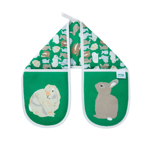 Pair of green organic cotton oven mitts with rabbit illustrations on a white background