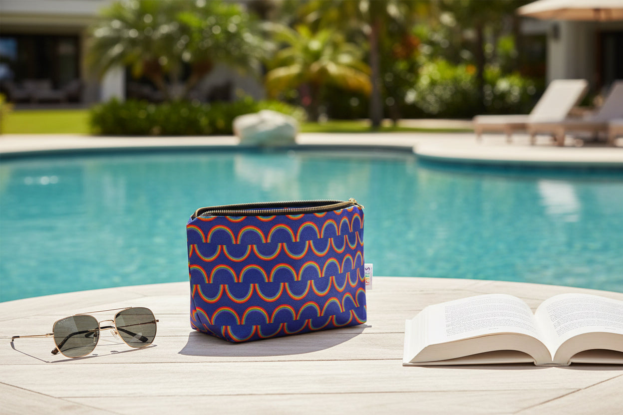 Keep your important bits and bobs safe by the poolside in a rainbow really useful bag 