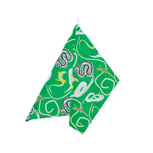Green Kitchen cloth with British snakes and lizards design shown hanging against a white background