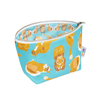 Zipper pouch with squirrel pattern on a blue background