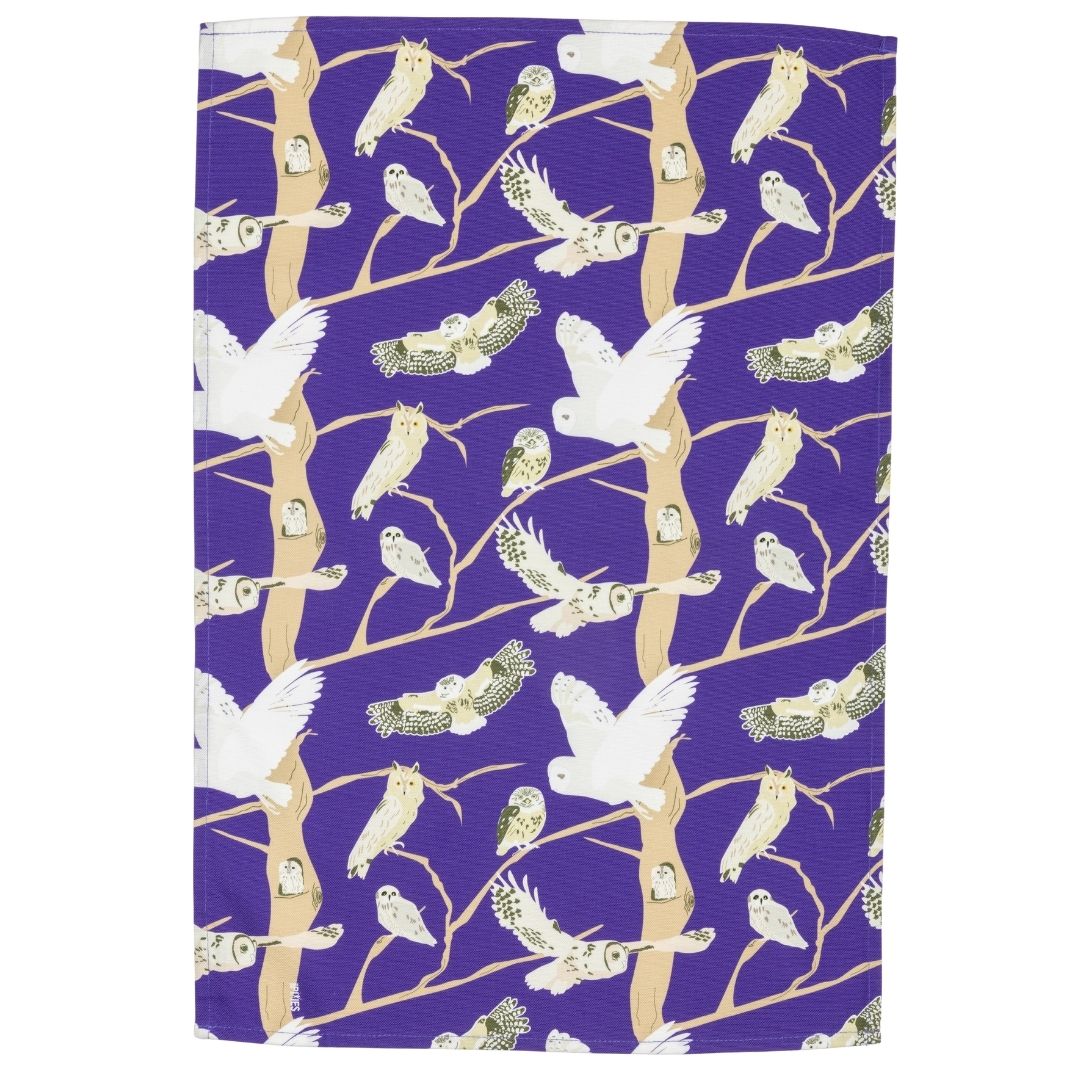 Purple organic cotton tea towel with pattern featuring the 5 species of native British owls. Great gift for bird lovers and wildlife fans, illustrations include the barn owl, tawny owl and more