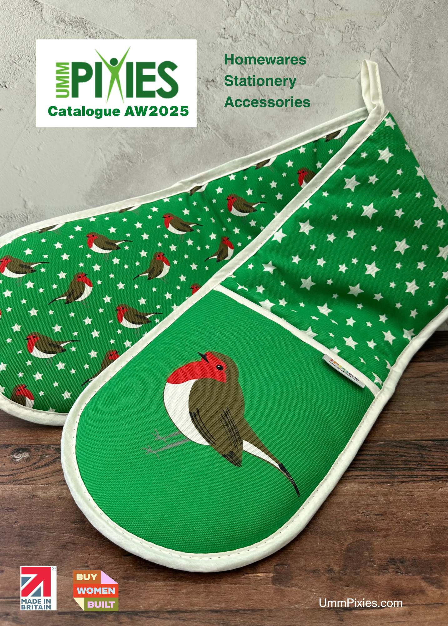 Cover of UmmPixies Trade Catalogue showing green robins oven gloves on a wooden countertop 