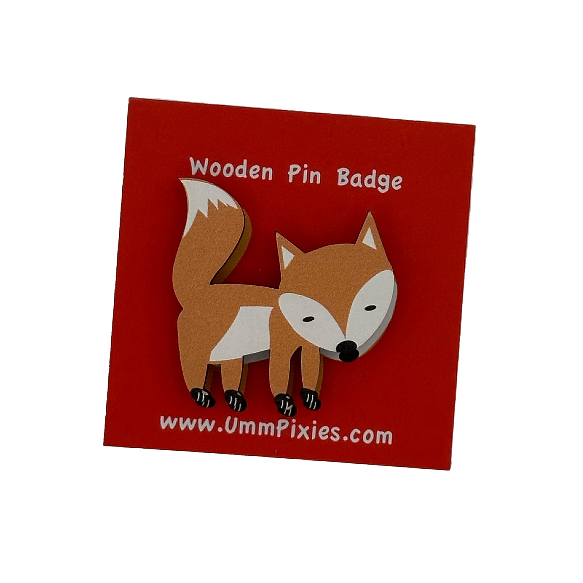 Walking Fox Wooden pin badge shown on display card