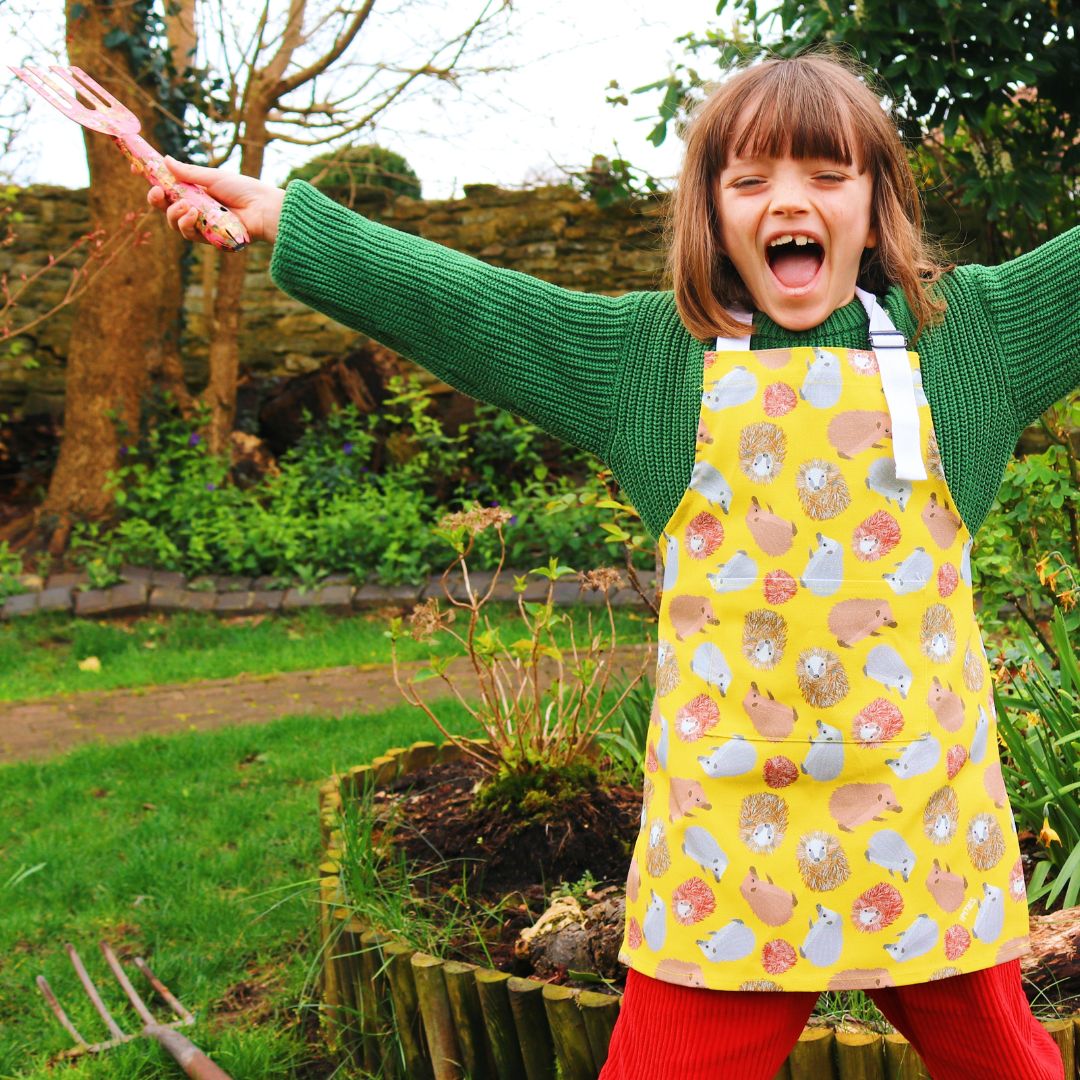  Child wear younger child size hedgehog apron (up to 5years) whilst gardening Photo credit @rachelandthelittlebirds