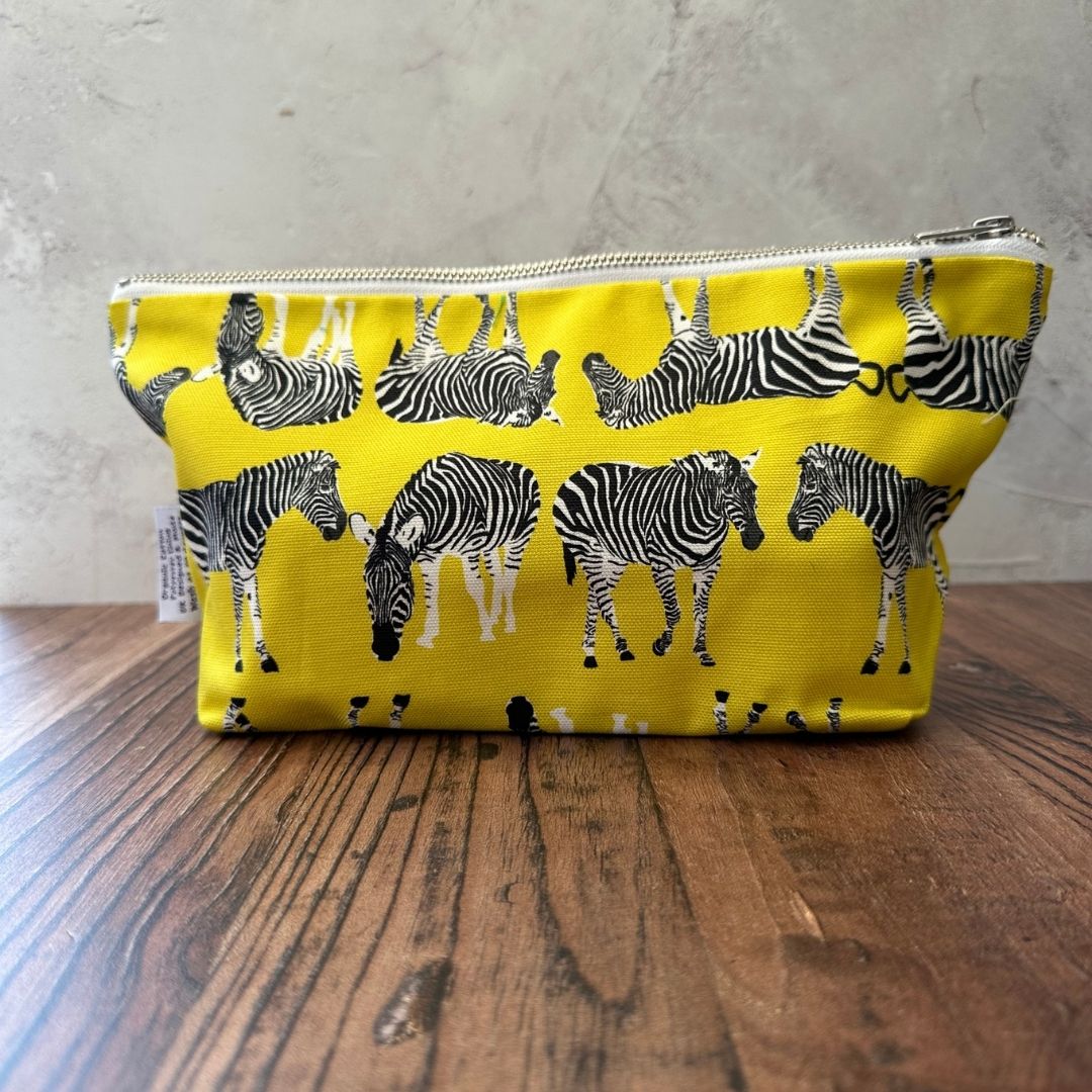 Bright yellow Zebra illustrated really useful bag shown closed