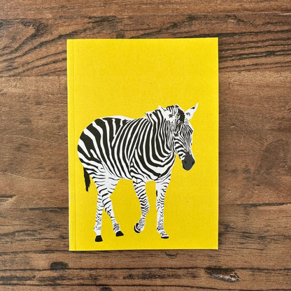 front cover of yellow zebra design pocket notebook 