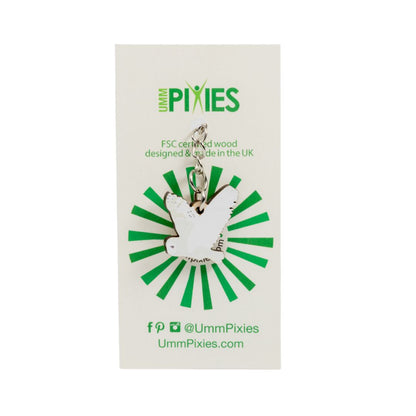 Umm Pixies Barn Owl in flight wooden charm on a branded card with green and white design