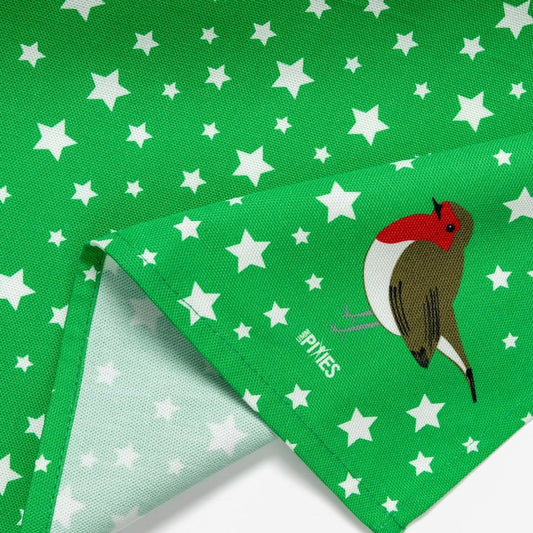 Bright Green cotton tea towel with white star pattern and robin redbreast motif, close up of the robin motif in the corner