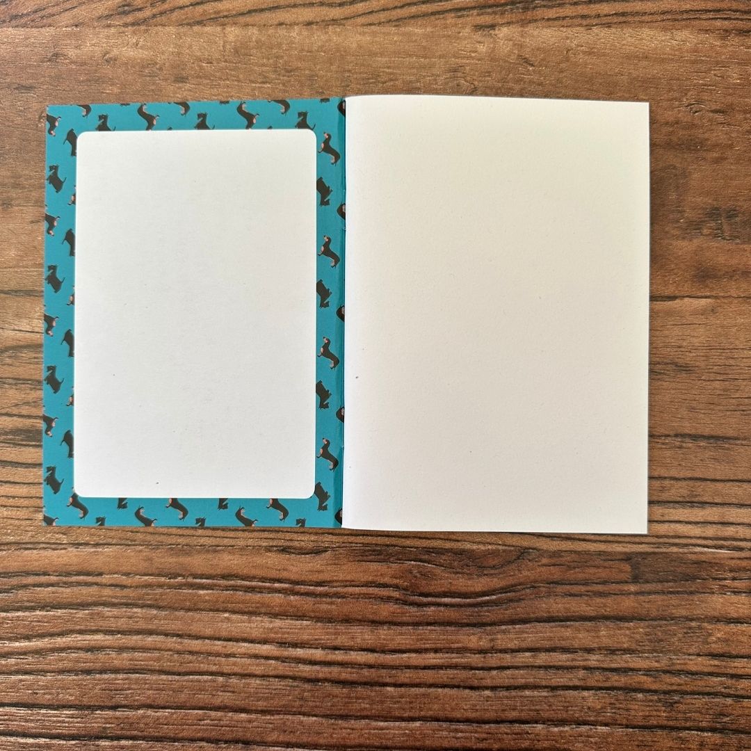 detail of the Inside front cover of dog pocket notebook showing design detail
