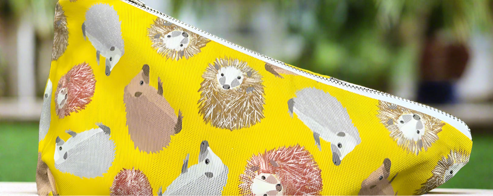 yellow hedgehog bag machine washable organic cotton outer, printed waterproof lining