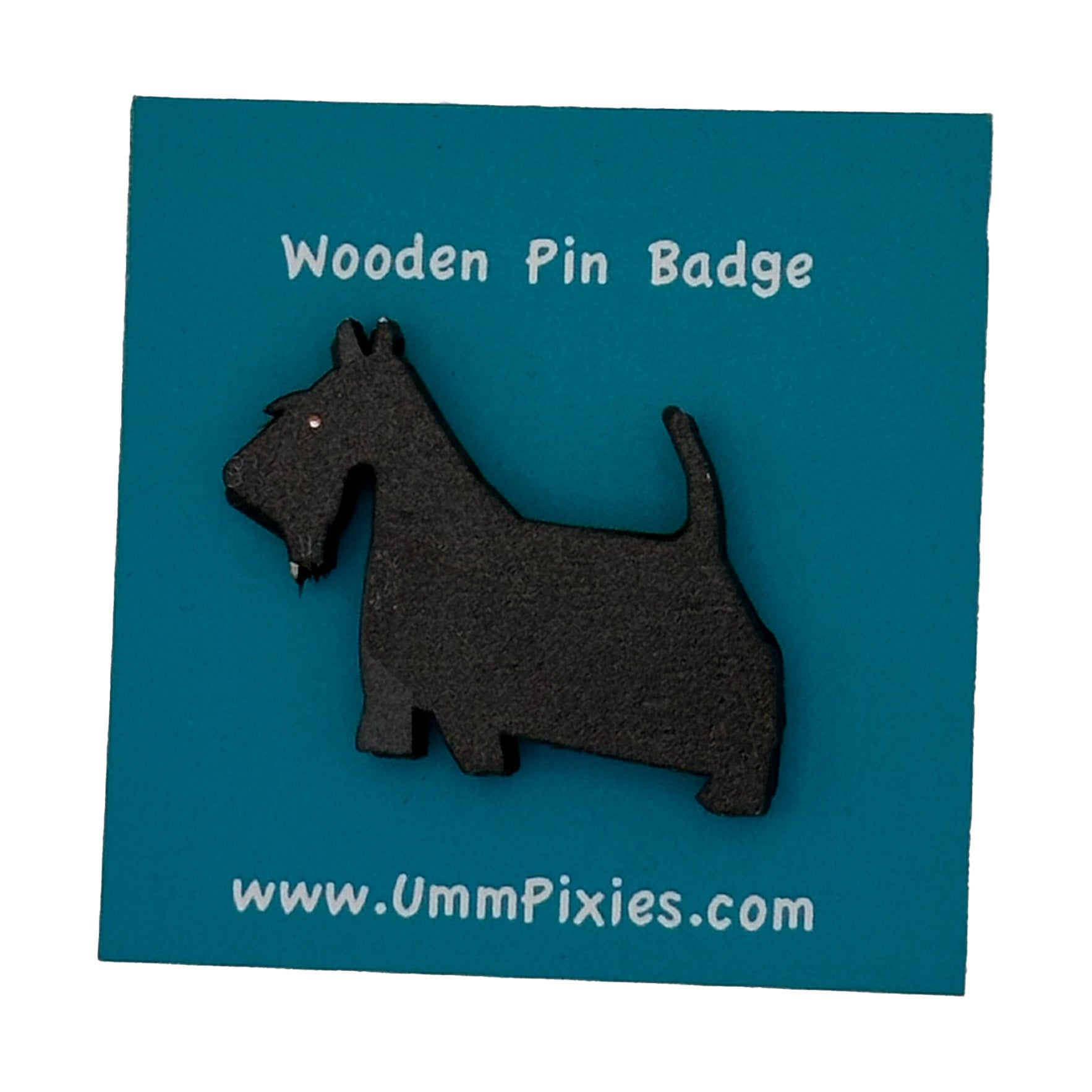 Scottish Terrier Wooden pin badge shown on display card