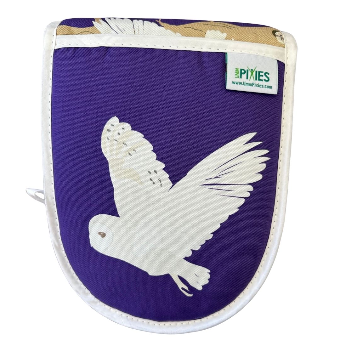 close up of left mitt of owls oven gloves showing barn owl illustration