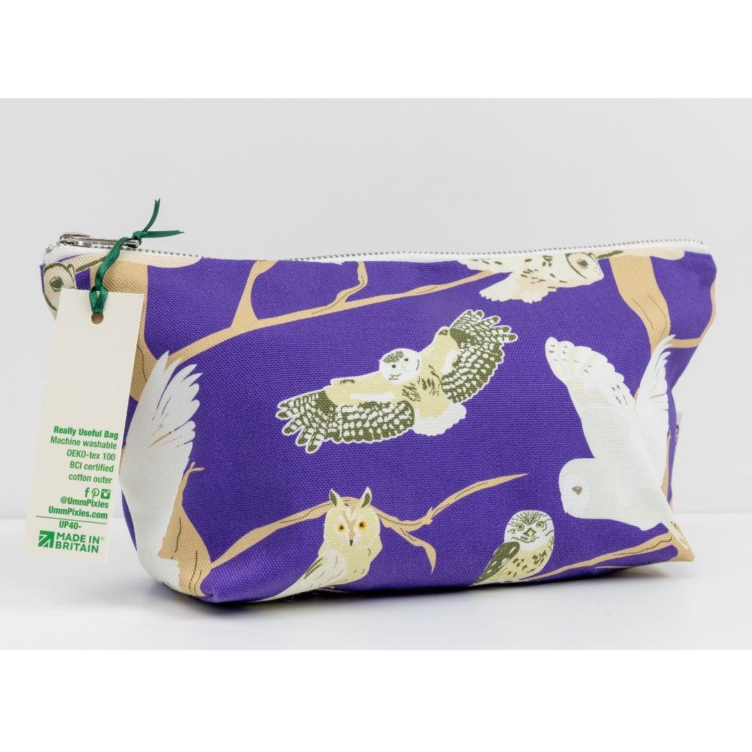 Purple zipped pouch with British owls design shown with the designer UmmPixies' Swing Tag
