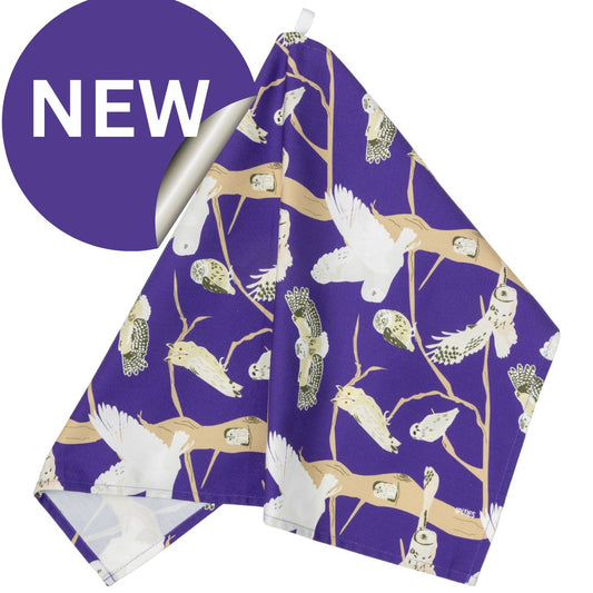 Purple organic cotton tea towel with pattern featuring the 5 species of native British owls. Great gift for bird lovers and wildlife fans, illustrations include the barn owl, tawny owl and more