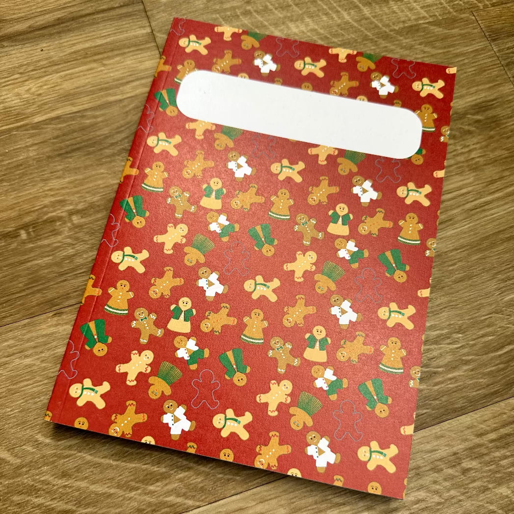 Gingerbread journal on wooden surface
