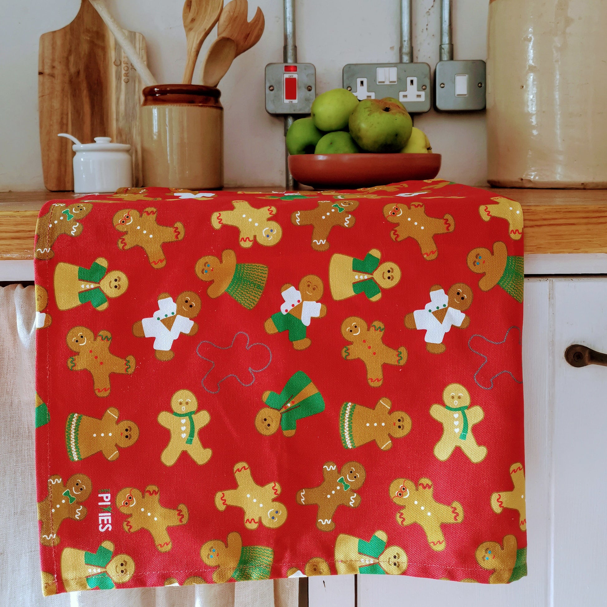 Gingerbread Folk Tea Towel in organic Cotton from UmmPixies. Designed and made in the UK