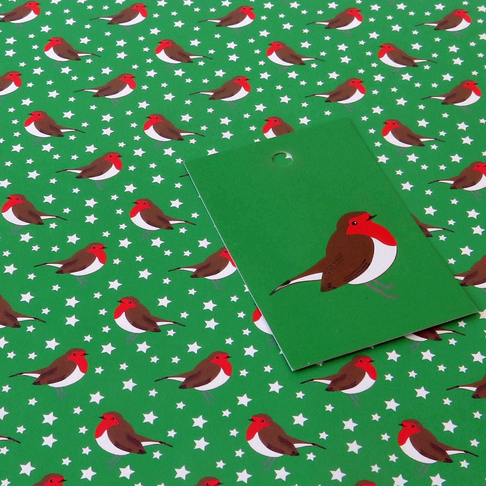 Green robin gift tag shown on green robin wrapping paper from Ummpixies
