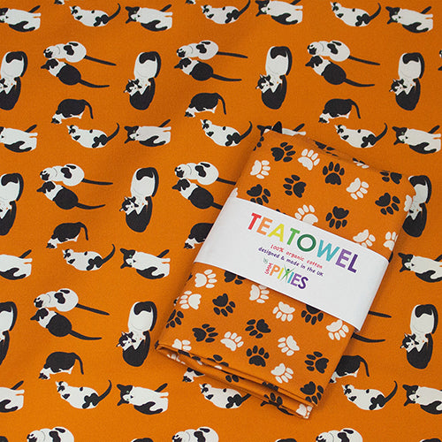 Black and white cats tea towels and paw prints tea towel